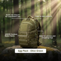 Thumbnail for An olive green curve tactical backpack is shown standing on a mossy rock in a sunlit forest, with overlaid callout text describing features such as quick zip closure, easy carry, 1000D Cordura nylon fabric, and suitability for picnics and shopping trips.