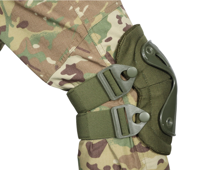 Olive Green knee pad with straps and buckles on camouflage trousers. 