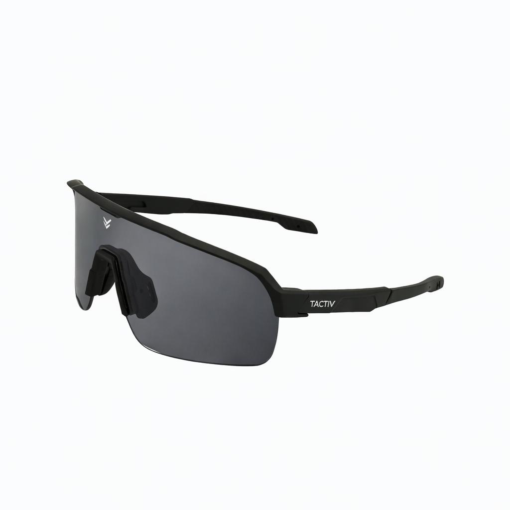 Left side angle view of Tactiv vantage black photochromic eye shield with dark lens on a white background